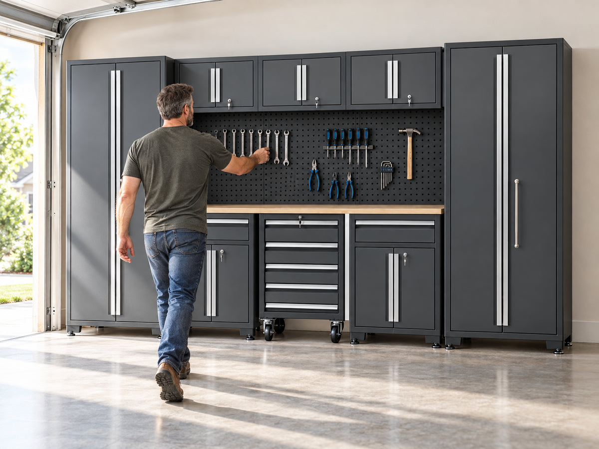 9-Piece Garage Shop Tool Storage, man walking confidently toward the cabinet wall
